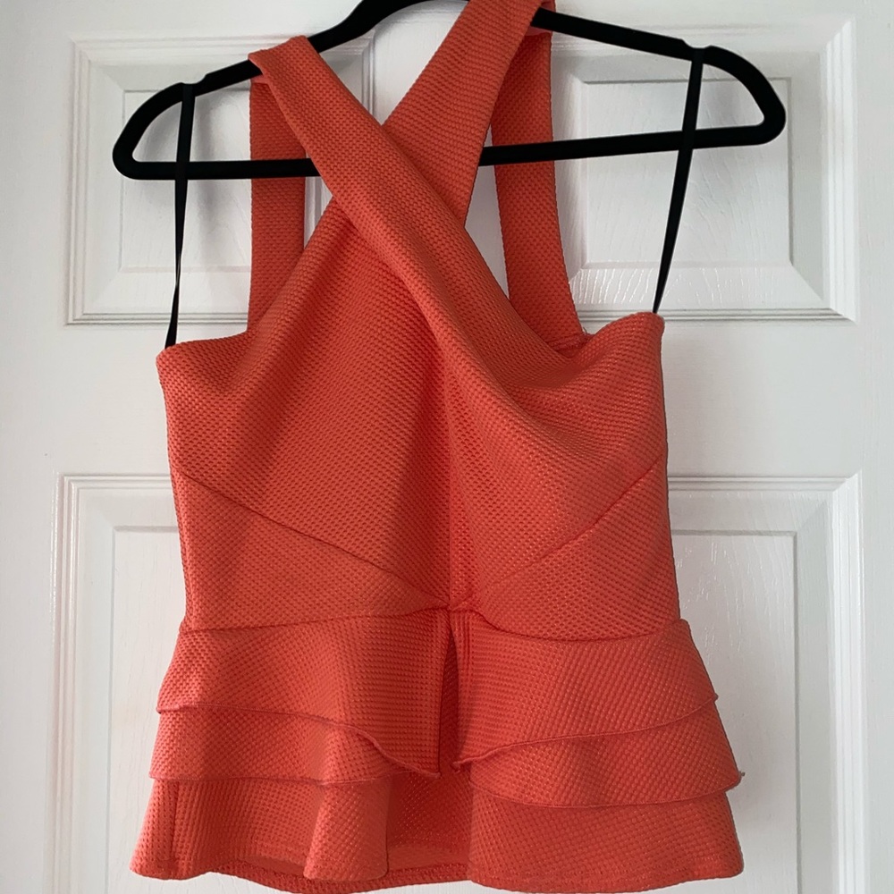 BEBE peplum top.